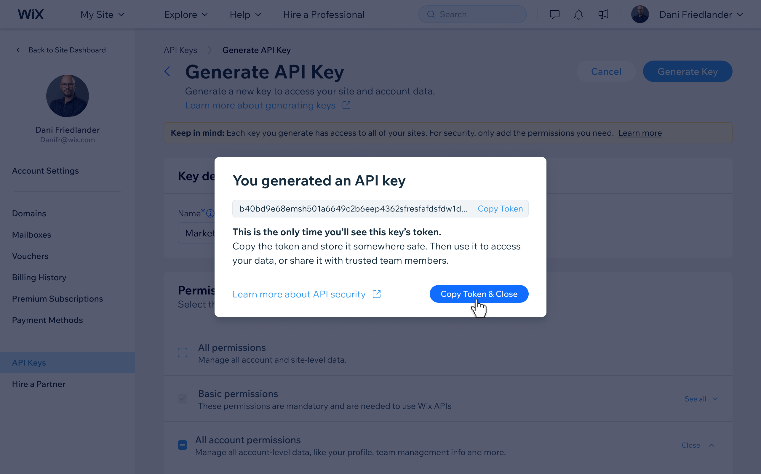 One-time key reveal — the token is only visible at this moment and must be copied before closing